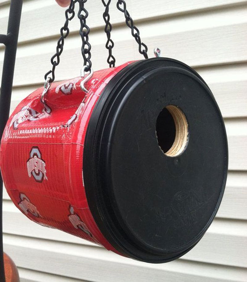 Plastic coffee container birdhouse
