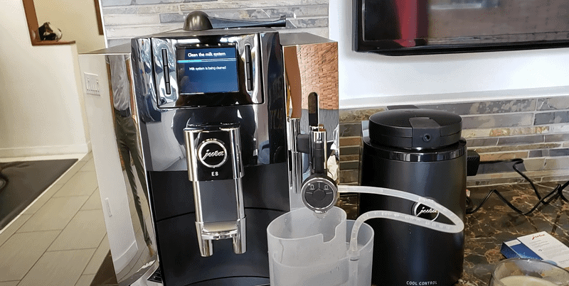 the e8 has automatic one touch milk cleaning system